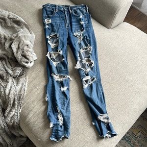 AE Super Distressed Skinny Jean